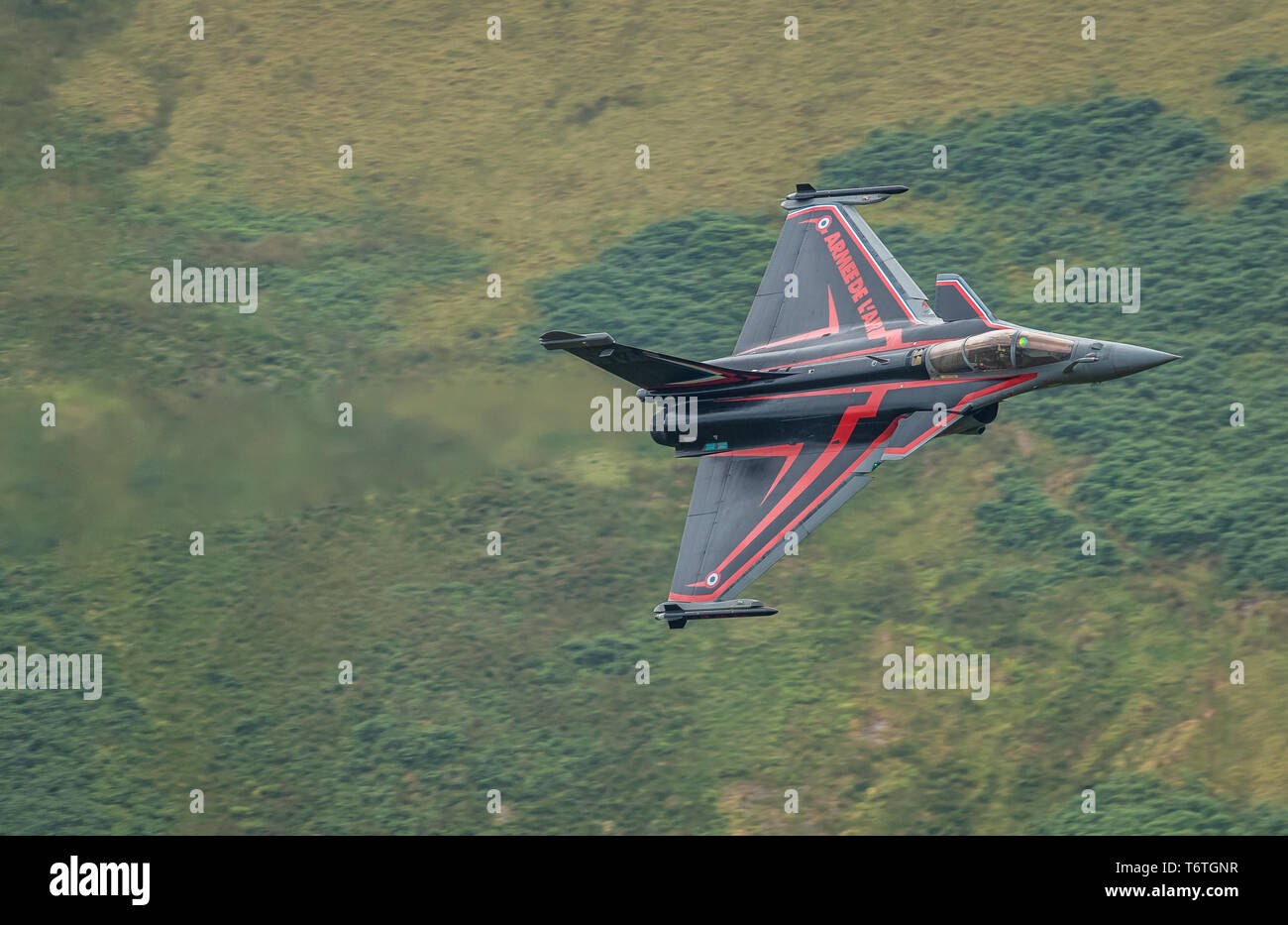 French Dassault Rafale flies low level through the Welsh Valleys after RIAT Stock Photo