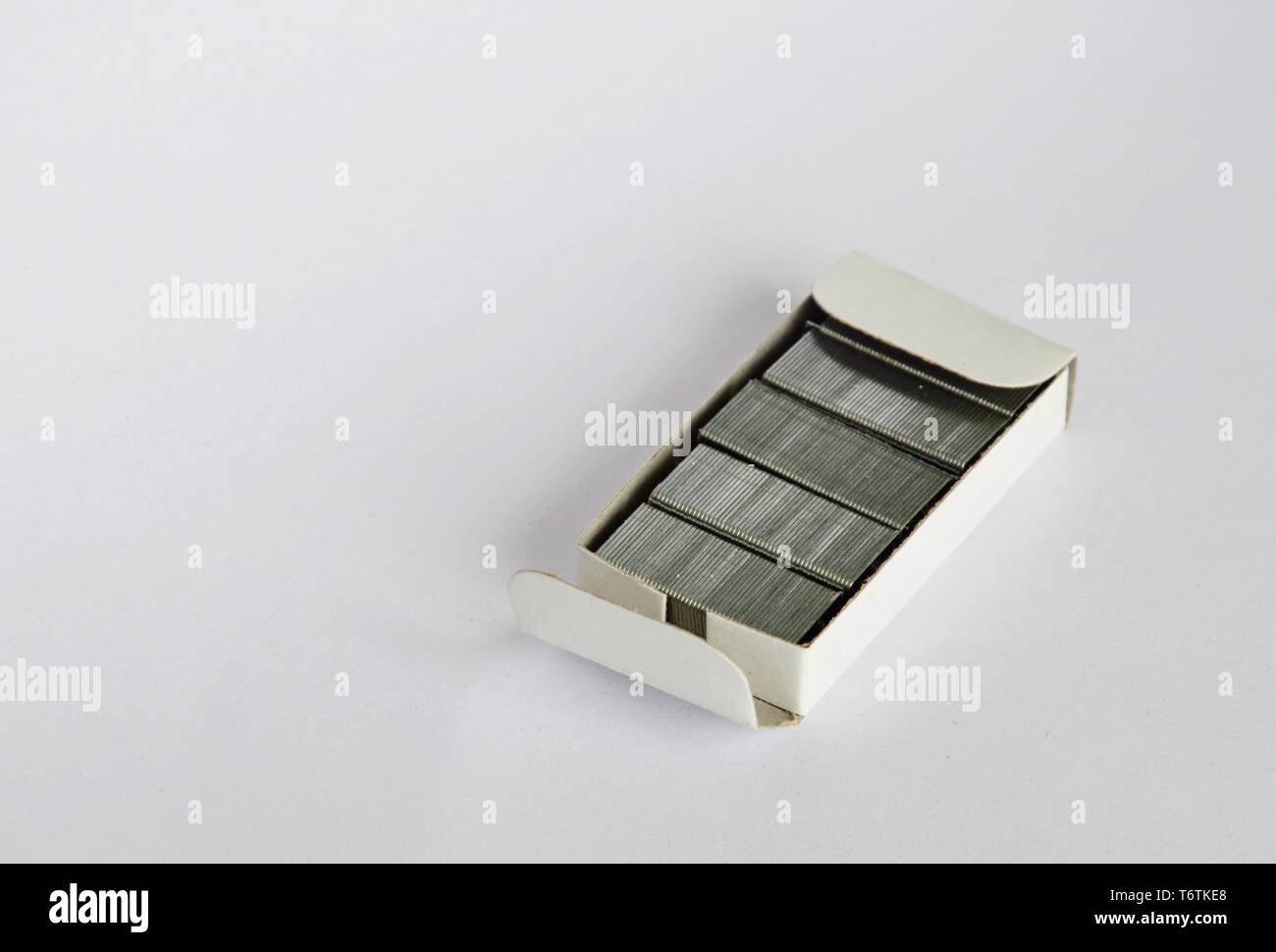 stapler wire in paper box on white background Stock Photo
