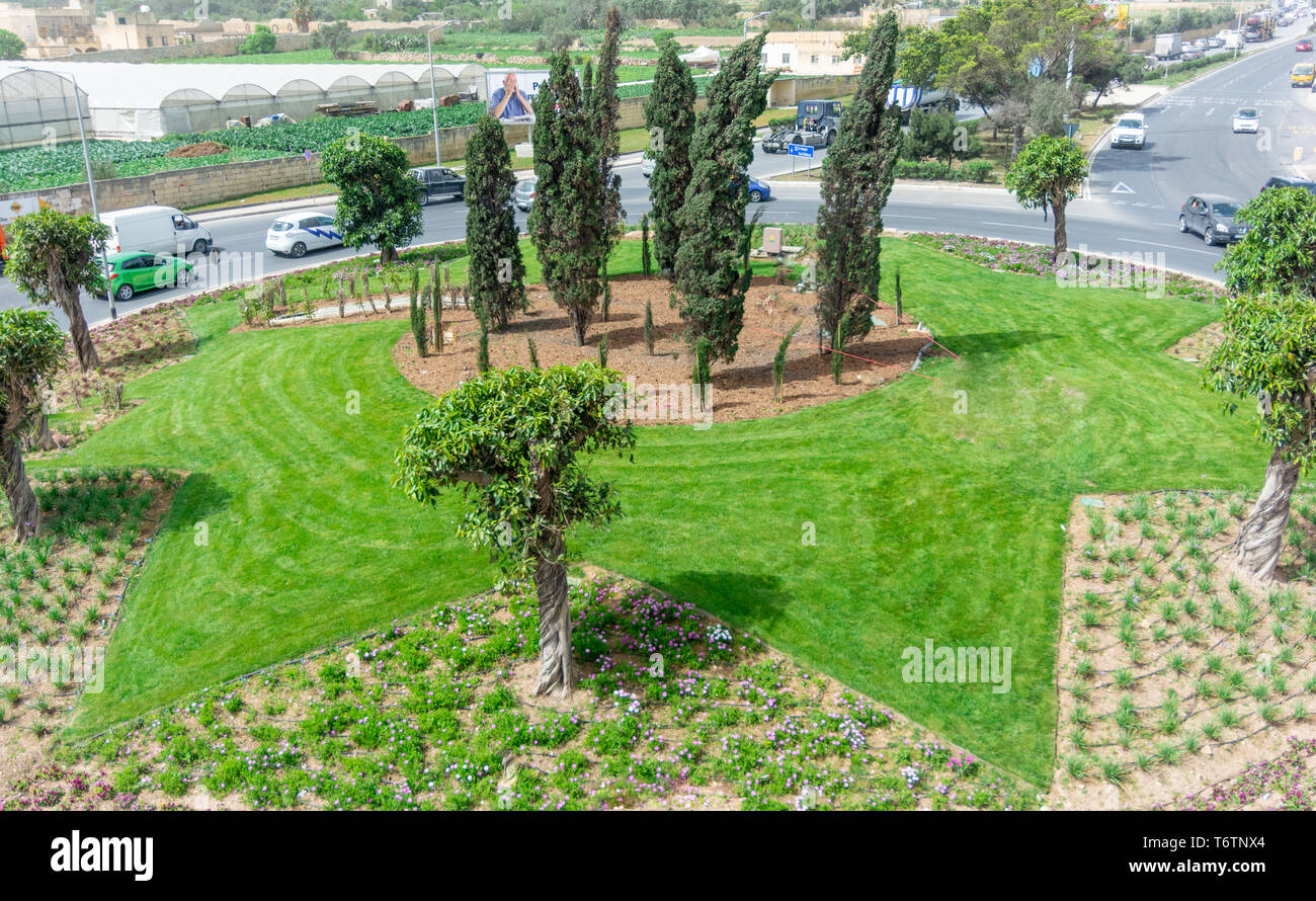Flowers arrangement and roundabouts in Malta and Gozo Stock Photo Alamy