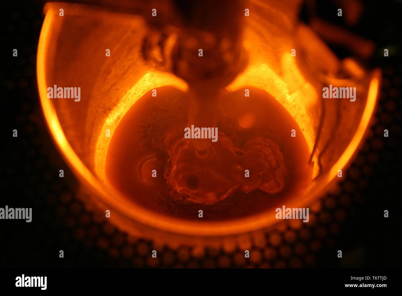 Nuclear waste being heated during a feedtoglass conversion experiment