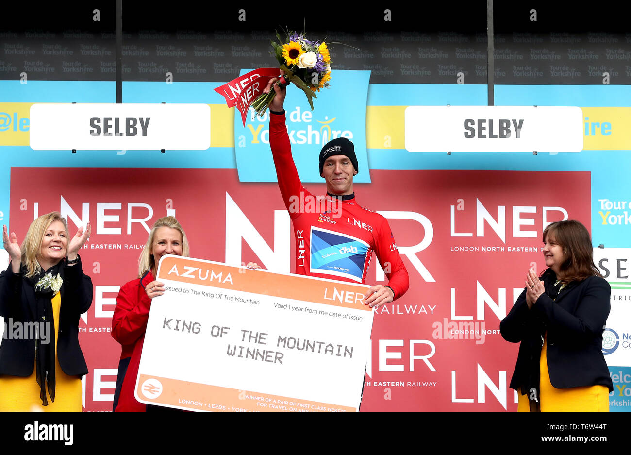 Team Canyon DHB PB Bloor Homes' Jacob Hennessy celebrates winning the King of Mountains Red Jersey during stage one of the Tour de Yorkshire. Stock Photo