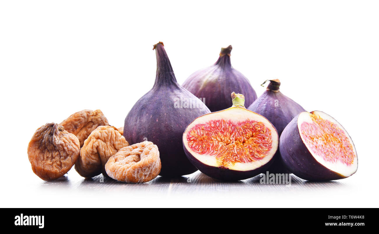 Composition with fresh and dried figs isolated on white. Stock Photo