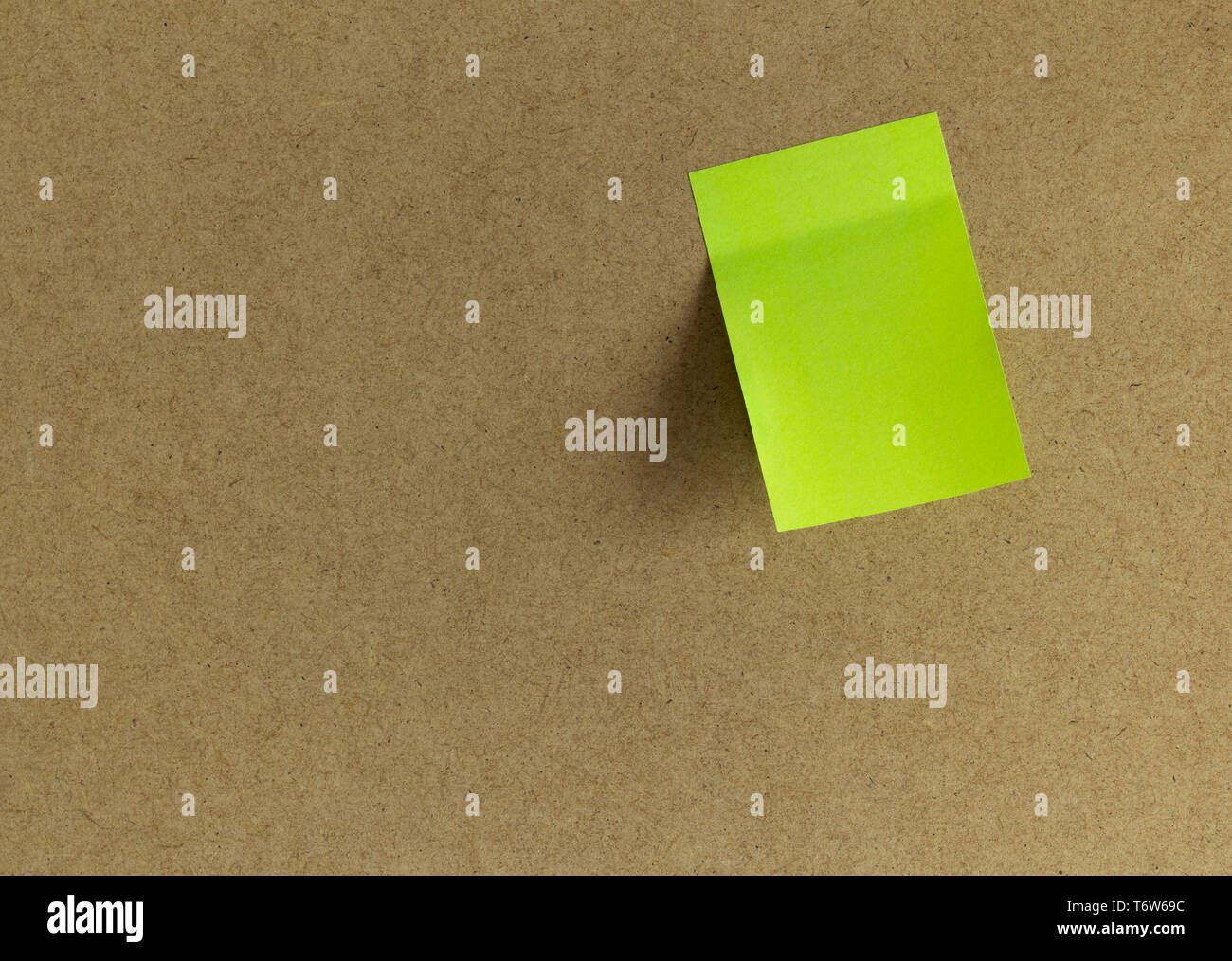 Sticky blank sheet of paper notes on wooden board Stock Photo - Alamy