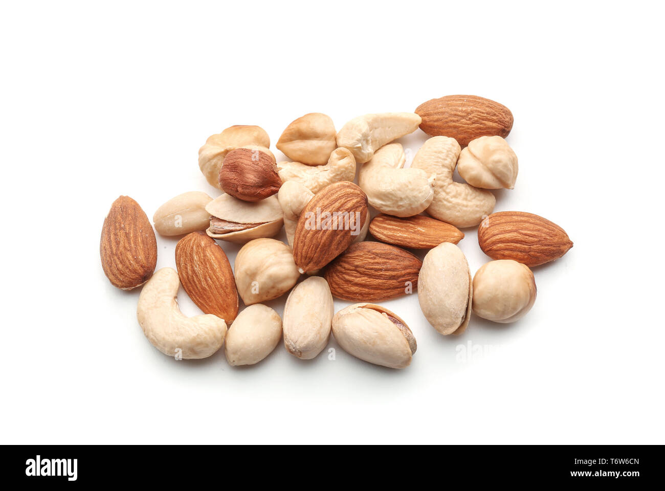 Different types of nuts on white background Stock Photo - Alamy