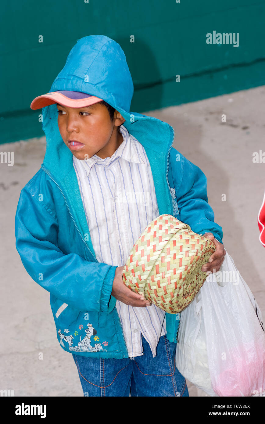 Tarahumara Indian selling handwoven baskets and other handicrafts