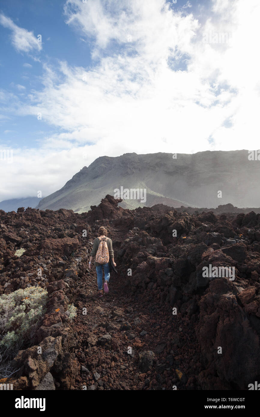 20 30 years old girl hiking alone in the beautiful coastline el hierro Stock Photo