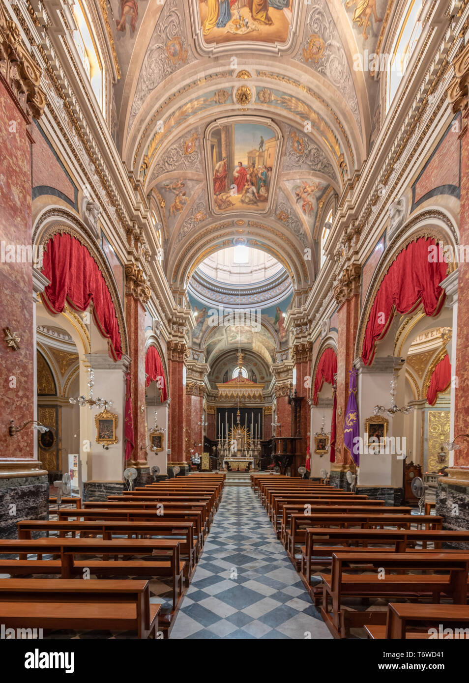 The lavish nave of Lorenzo Gafa's 17th century Collegiate Church of St Lawrence in Il-Birgu, Malta Stock Photo