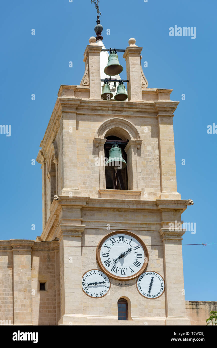 Girolamo Cassar's belfry of St John's Co-Cathedral in Valletta, Malta with Clerici's clock face and dials denoting the date, and the day of the week. Stock Photo