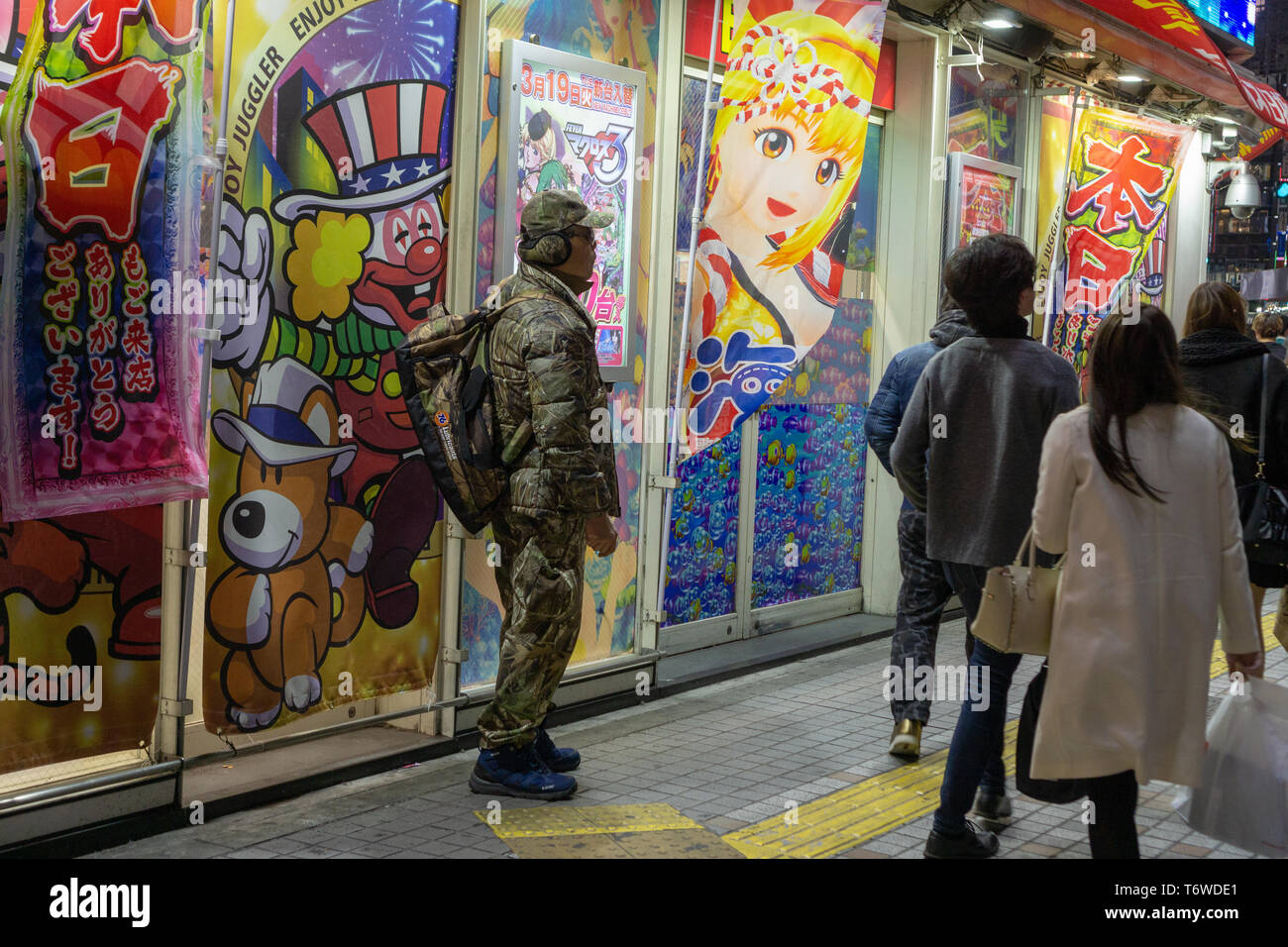 Tokyo Arcades - places where the locals & tourists can spend some together-alone time. A truly cultural experience. Amazing! Stock Photo