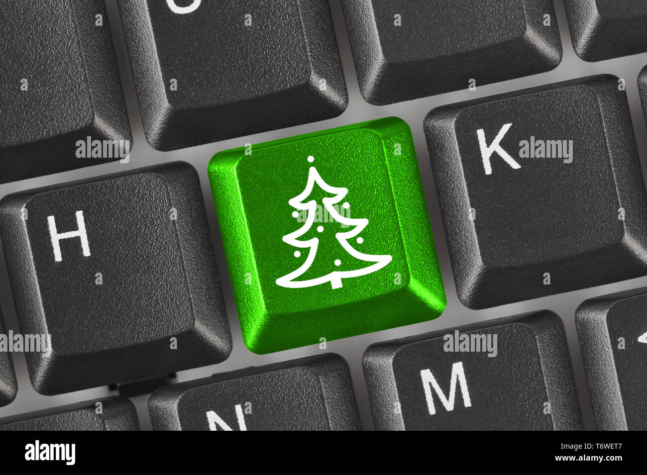 Computer keyboard with Christmas tree key Stock Photo Alamy