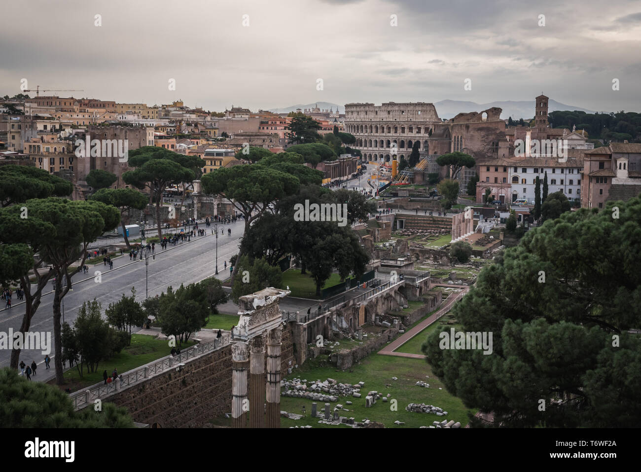 The ruins and the Colosseum of Rome from the monument Vittorio Emanuele II in Italy Stock Photo