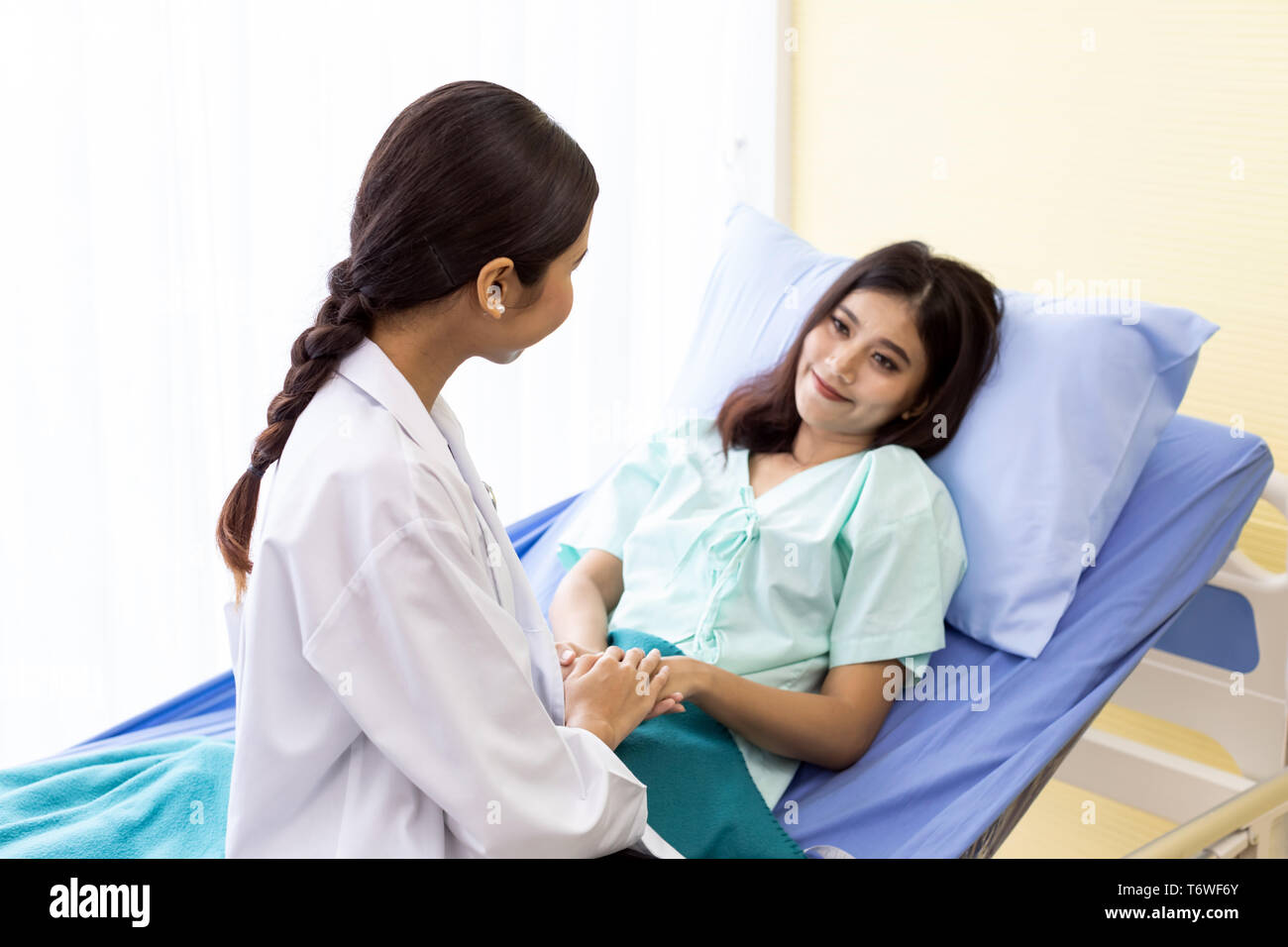 medical doctor hold patient hand Stock Photo Alamy