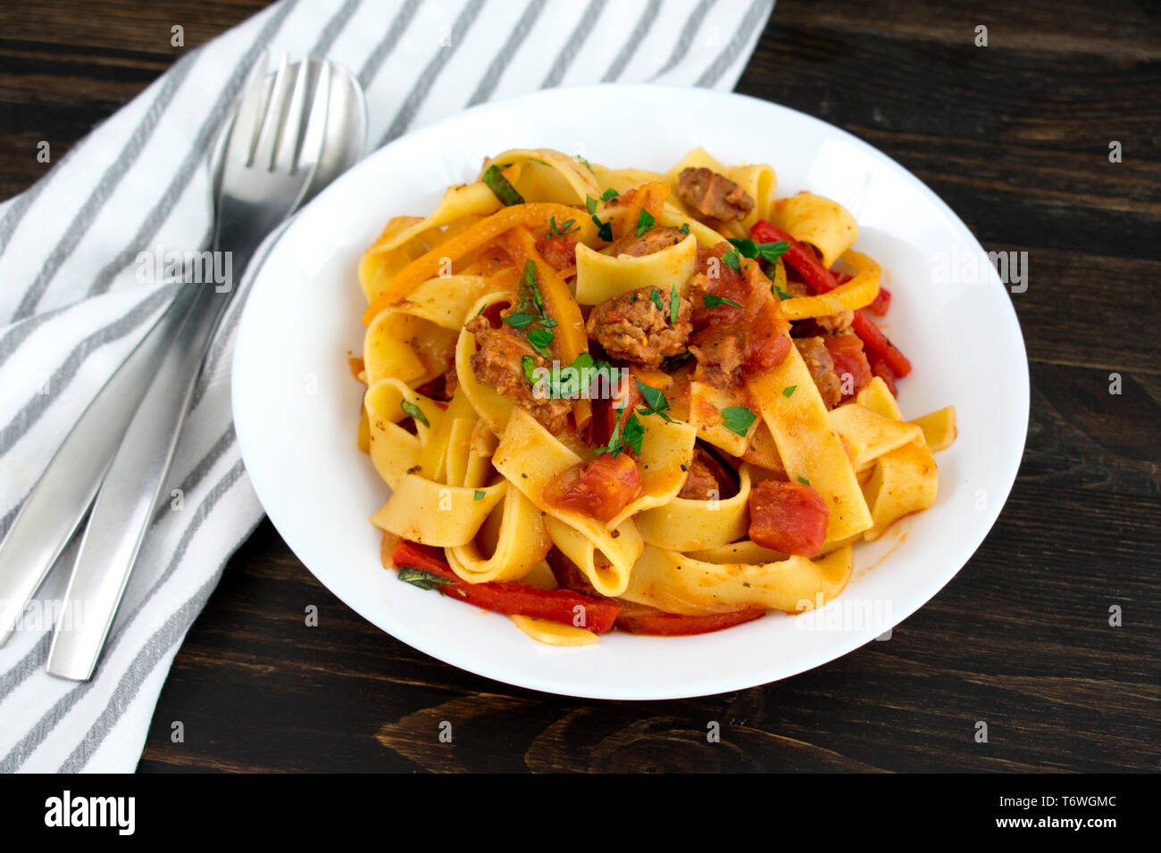 Pappardelle Pasta with Italian Sausage and Basil Stock Photo Alamy