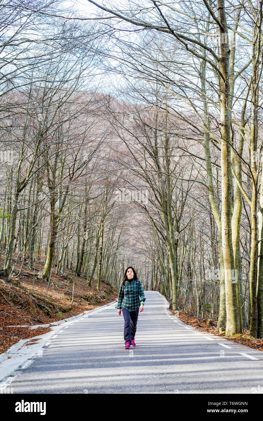 Beautiful woman walking road hi-res stock photography and images - Alamy