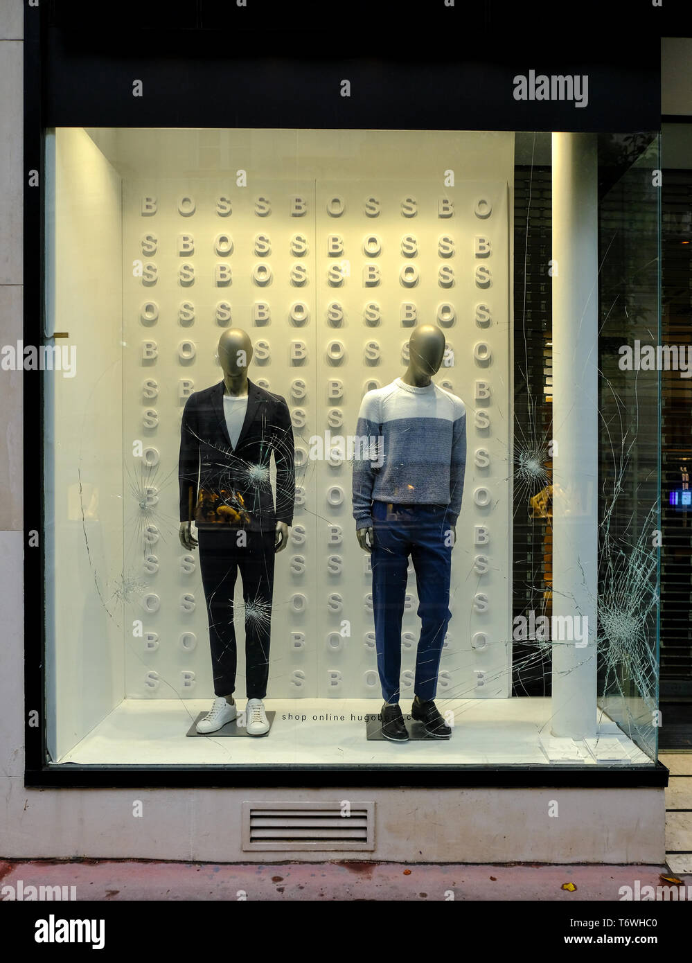 Broken windows of Hugo Boss store following May First and Yellow Jackets  manifestation in Montpellier, France, May 1, 2019 Stock Photo - Alamy