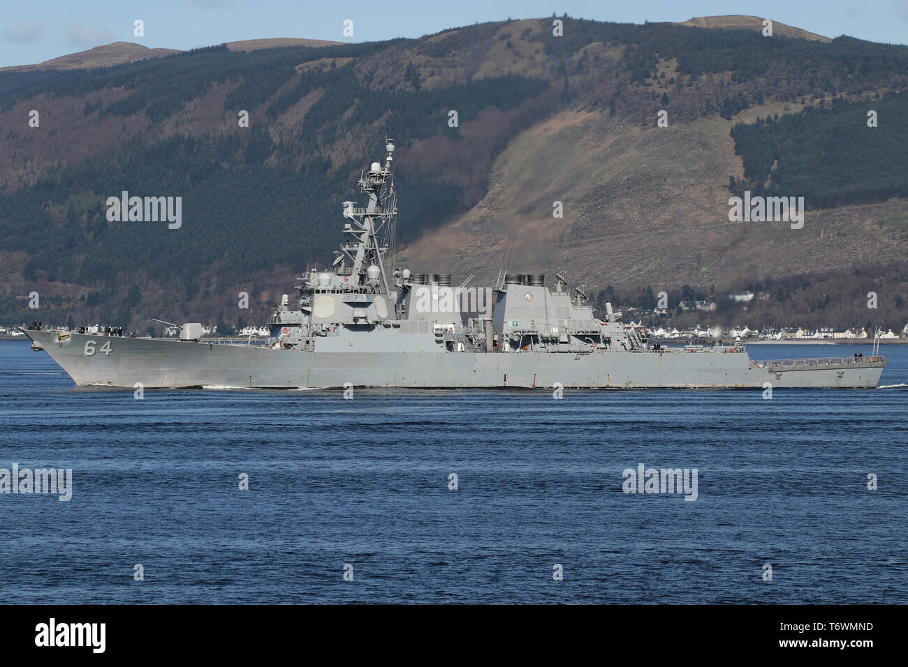USS Carney (DDG-64), an Arleigh Burke-class destroyer operated by the US Navy, passing Gourock at the start of Exercise Joint Warrior 19-1. Stock Photo