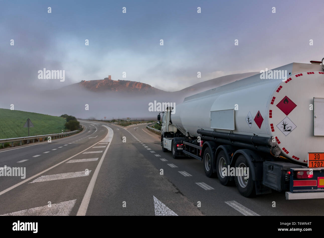 Tanker truck of dangerous goods on the road Stock Photo