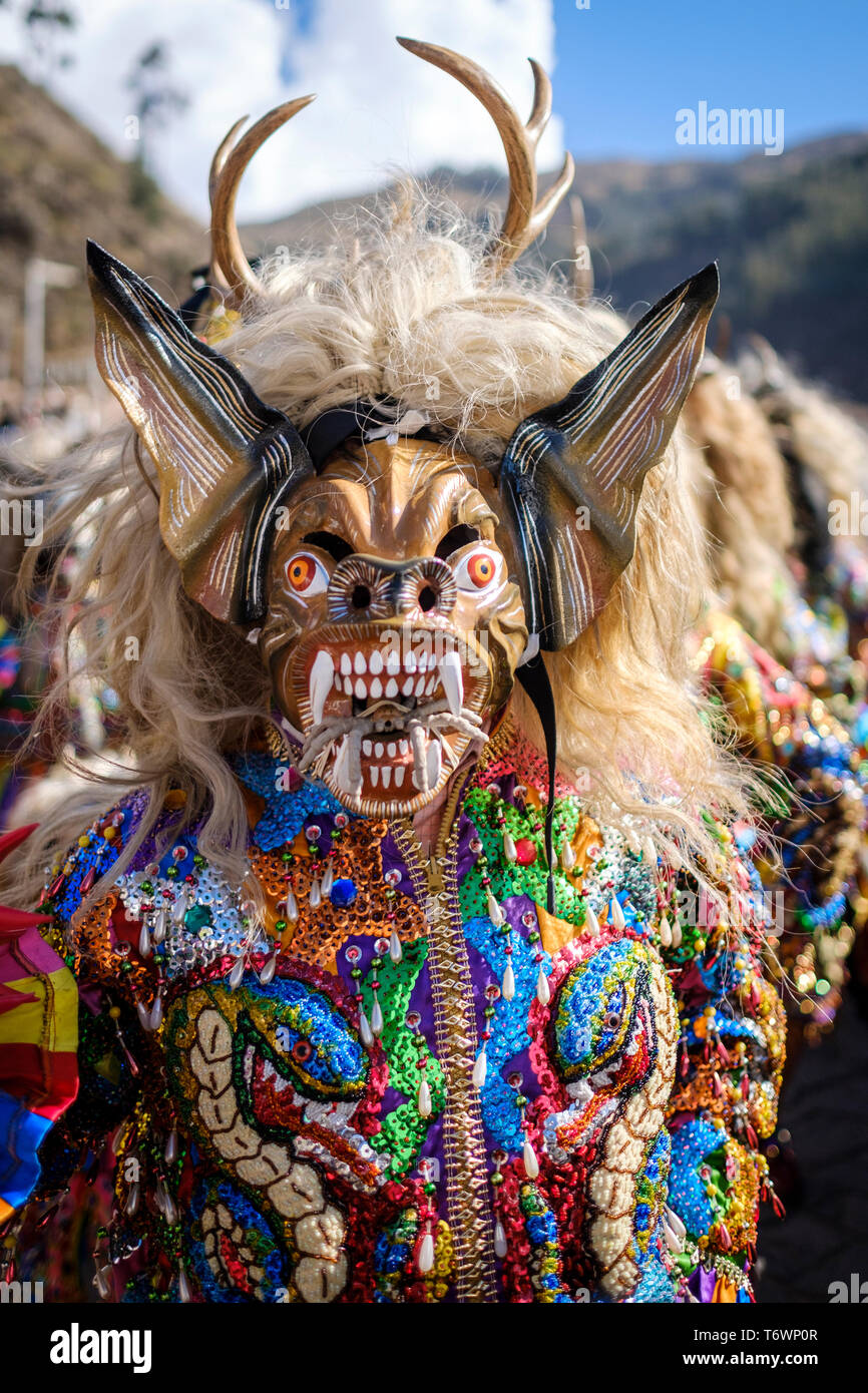 Masked and costumed characters performing as Saqras or Demons at ...