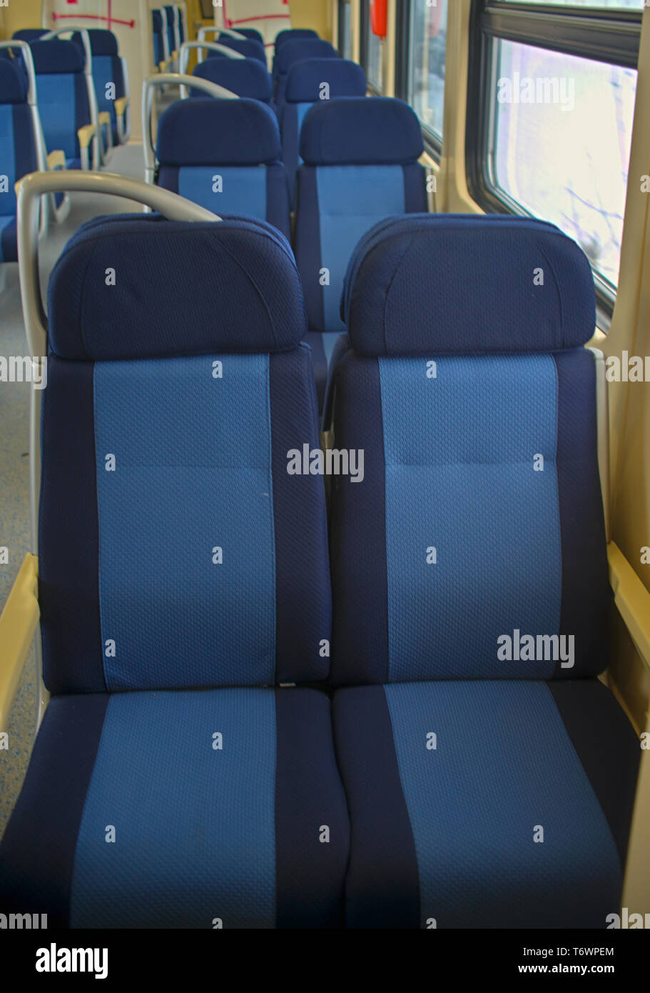 Row of empty seats in train wagon Stock Photo