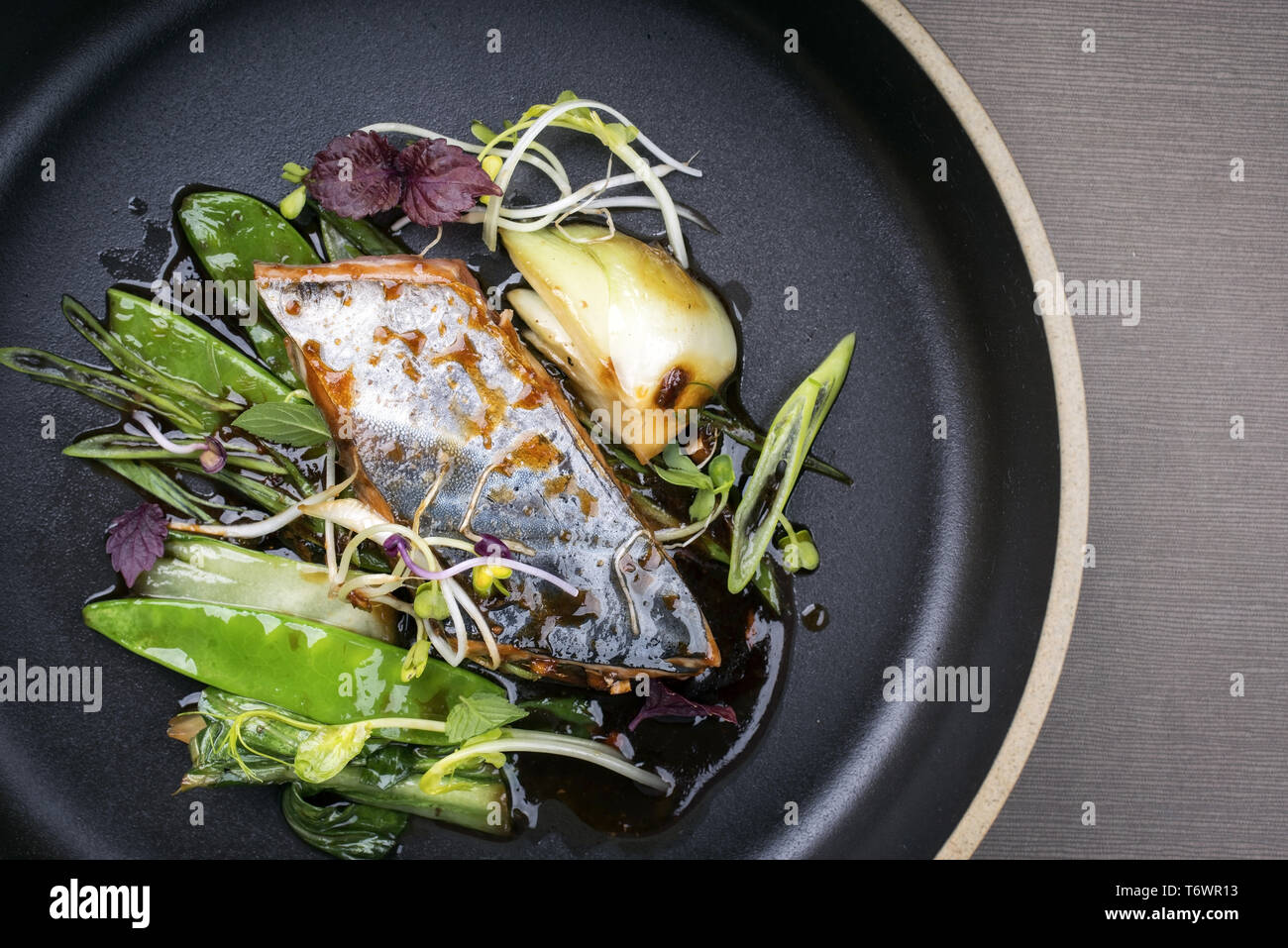 Modern style Japanese bonito tuna fish filet with vegetable glazed in ...