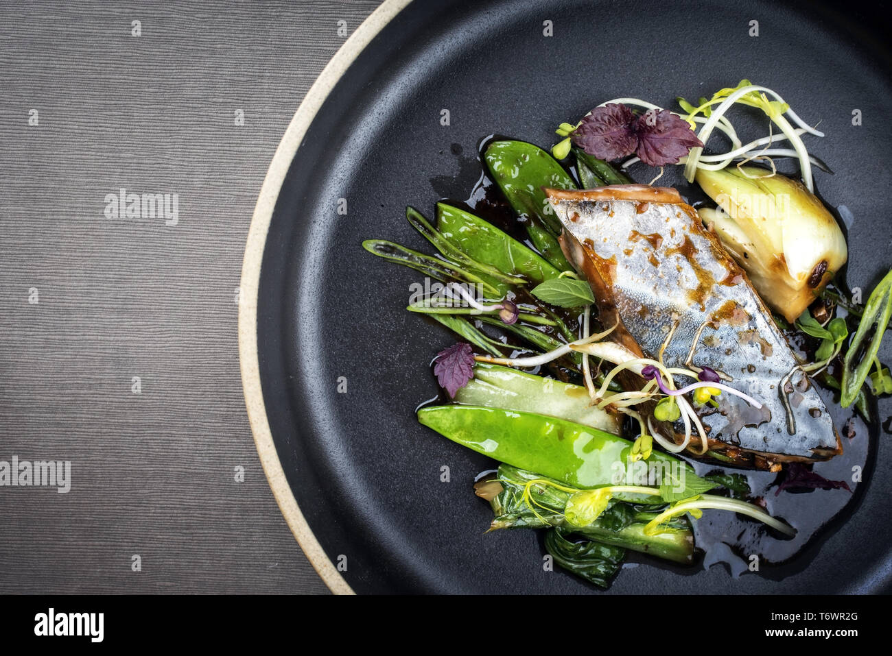 Modern style Japanese bonito tuna fish filet with vegetable glazed in ...