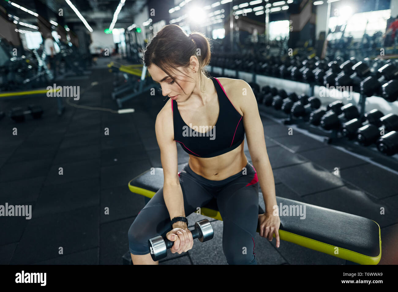 Fit girl with red short hair in gym Stock Photo - Alamy