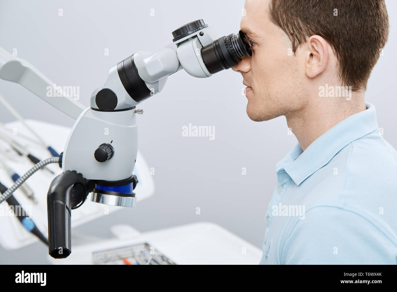 Working with microscope Stock Photo Alamy