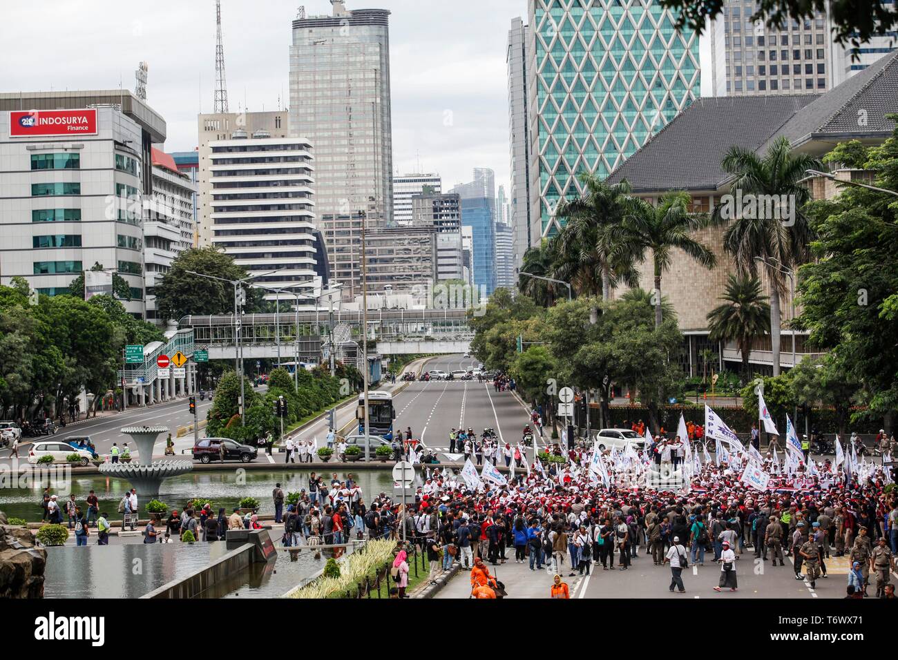 Thousand of labourers seen gathered  during the rally to mark International Workers' Day in Jakarta. Protesters across Indonesia have organized rallies to demand better working conditions. Stock Photo