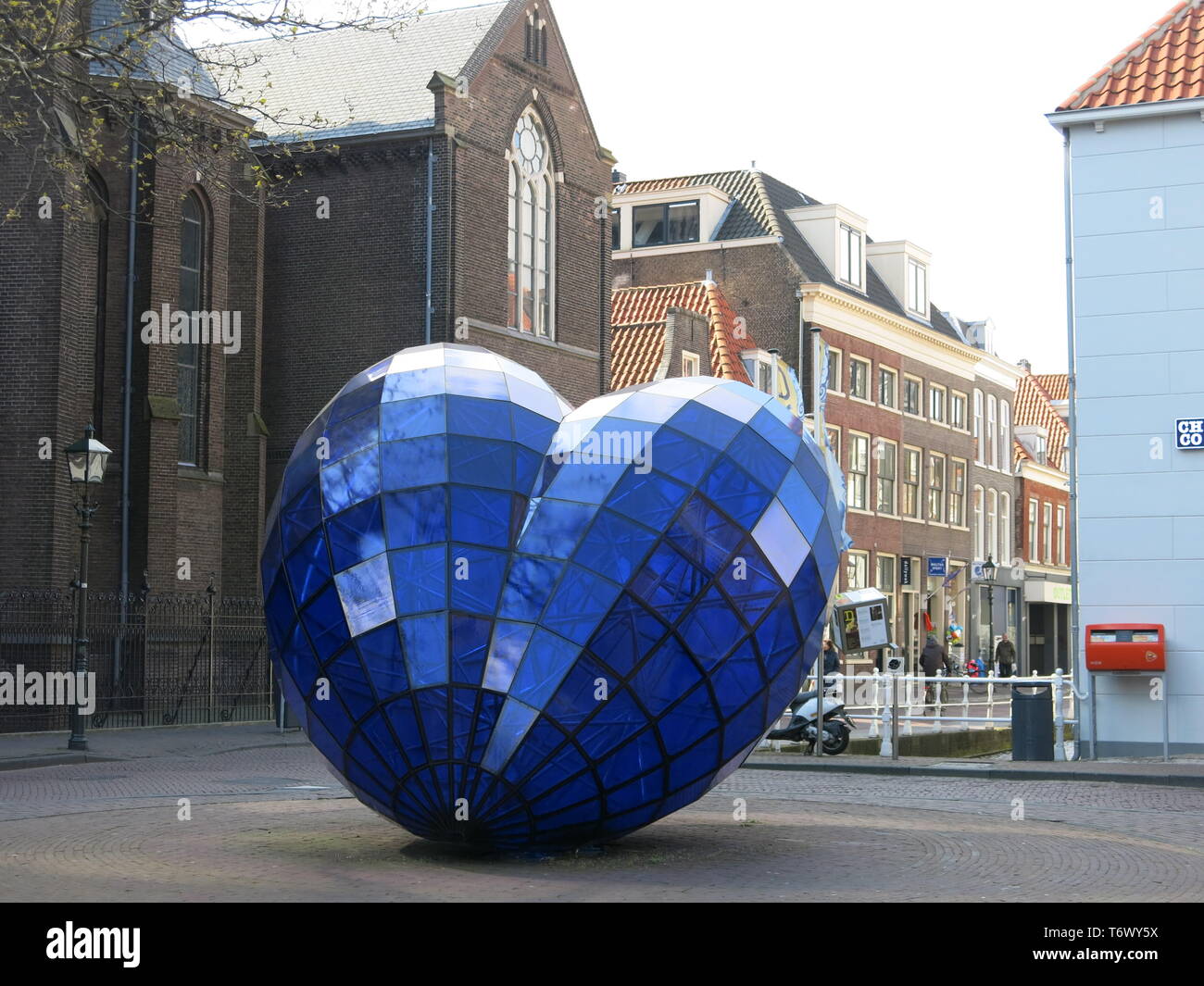 A large street sculpture in the shape of a heart in the Royal Delft blue colour as a tribute to the heritage of pottery production in the town. Stock Photo