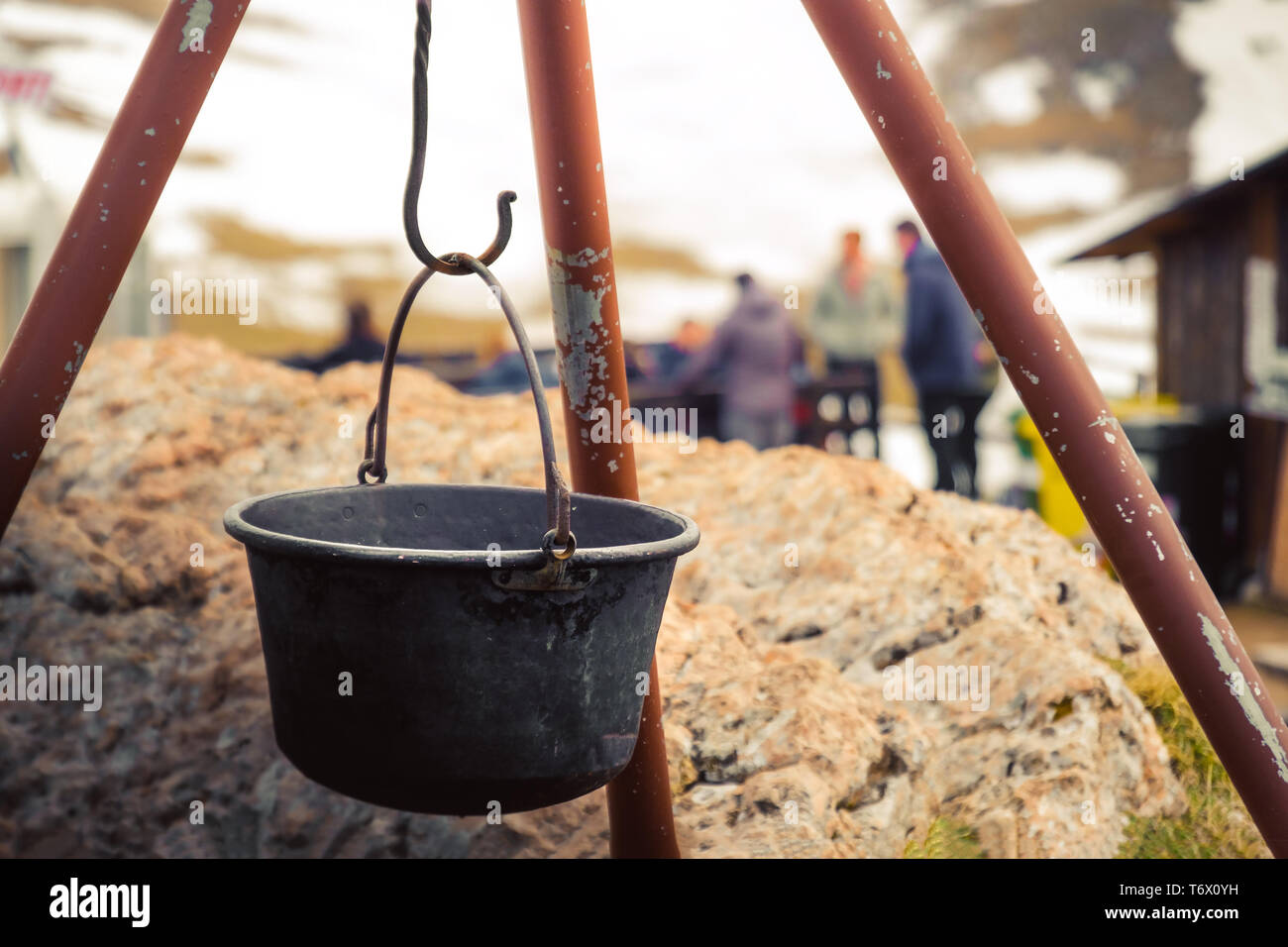 bivouac fireplace shelter camp out in mountain cauldron campfire . Stock Photo