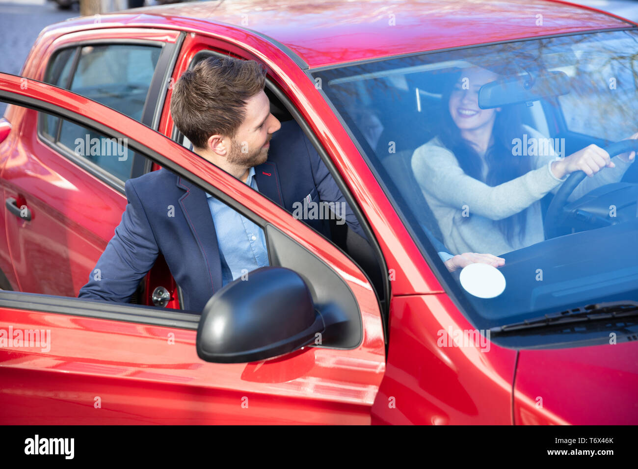 Handsome Man In Suit Getting In Car Stock Photo