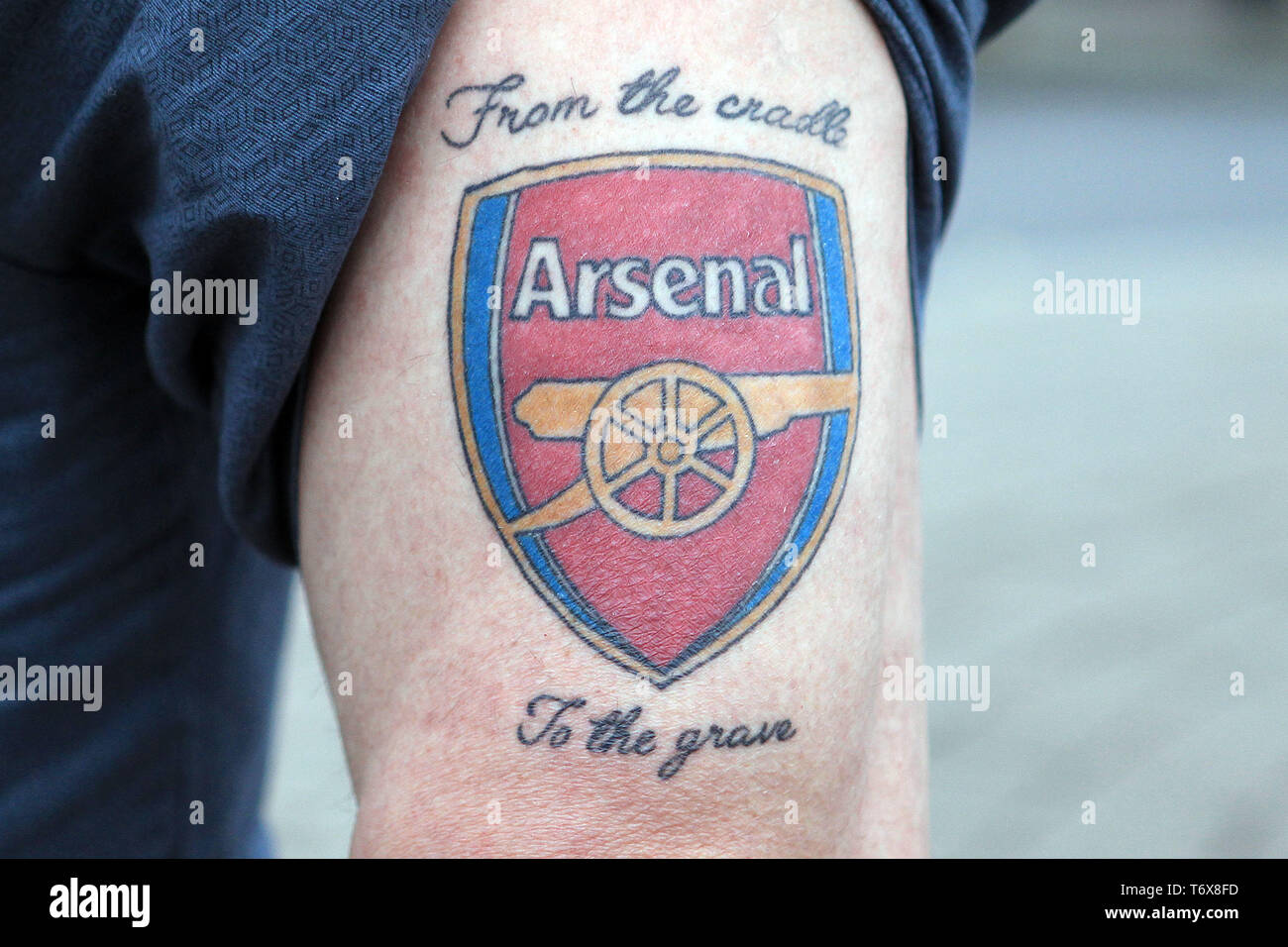 London Uk 02nd May 2019 An Arsenal Fan Shows Off His Tattoo Of