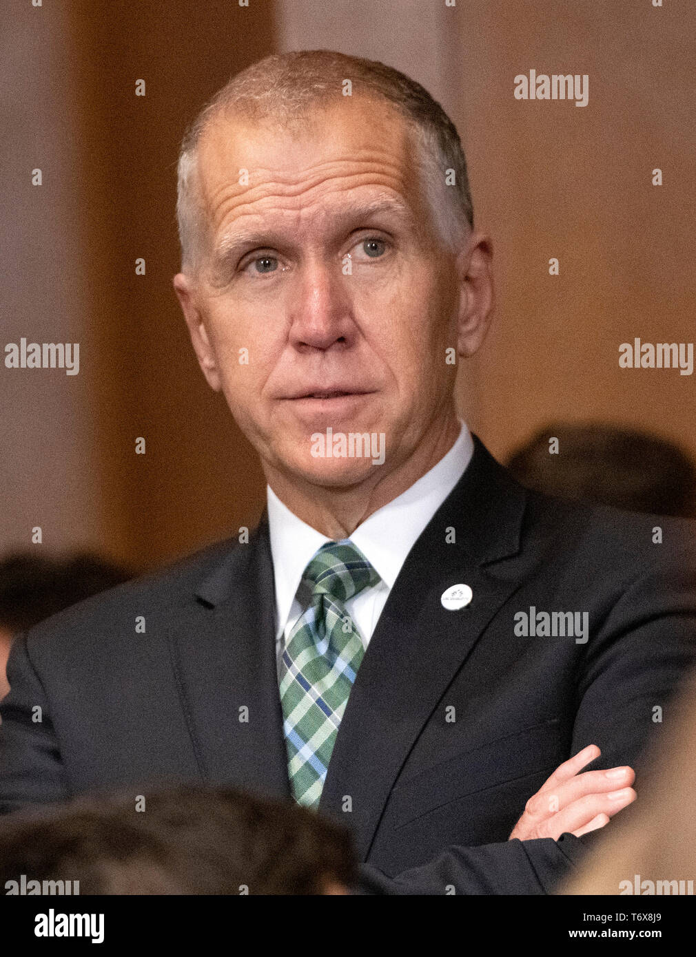 United States Senator Thom Tillis (Republican of North Carolina) looks on from the back of the room as US Attorney General William P. Barr testifies before the US Senate Committee on the Judiciary on the “Department of Justice's Investigation of Russian Interference with the 2016 Presidential Election” on Capitol Hill in Washington, DC on May 1, 2019. The hearing will begin to answer questions about how the DOJ handled the conclusions from the Mueller probe. Credit: Ron Sachs/CNP (RESTRICTION: NO New York or New Jersey Newspapers or newspapers within a 75 mile radius of New York City) | usa Stock Photo