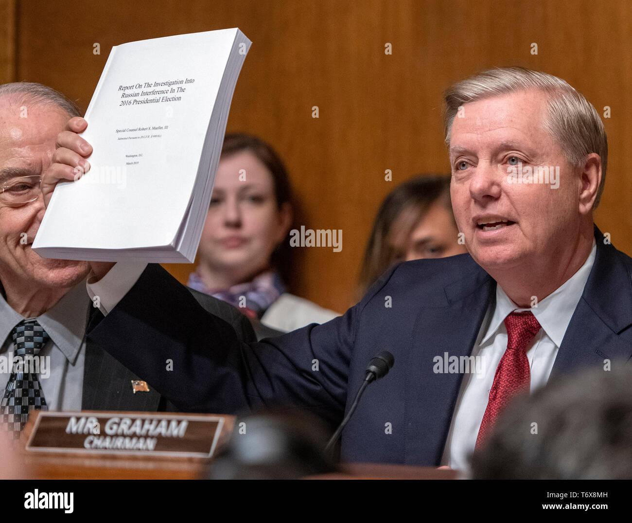 United States Senator Lindsey Graham (Republican of South Carolina), Chairman, US Senate Judiciary Committee, holds a copy of the Mueller Report as he makes his opening statement prior to US Attorney General William P. Barr giving testimony before the US Senate Committee on the Judiciary on the “Department of Justice's Investigation of Russian Interference with the 2016 Presidential Election” on Capitol Hill in Washington, DC on May 1, 2019. The hearing will begin to answer questions about how the DOJ handled the conclusions from the Mueller probe. Credit: Ron Sachs/CNP (RESTRICTION: NO Ne Stock Photo