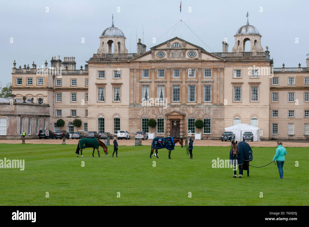 Badminton, Gloucestershire, United Kingdom, 3rd May 2019, Horses grazing in  front of Badminton House ahead of