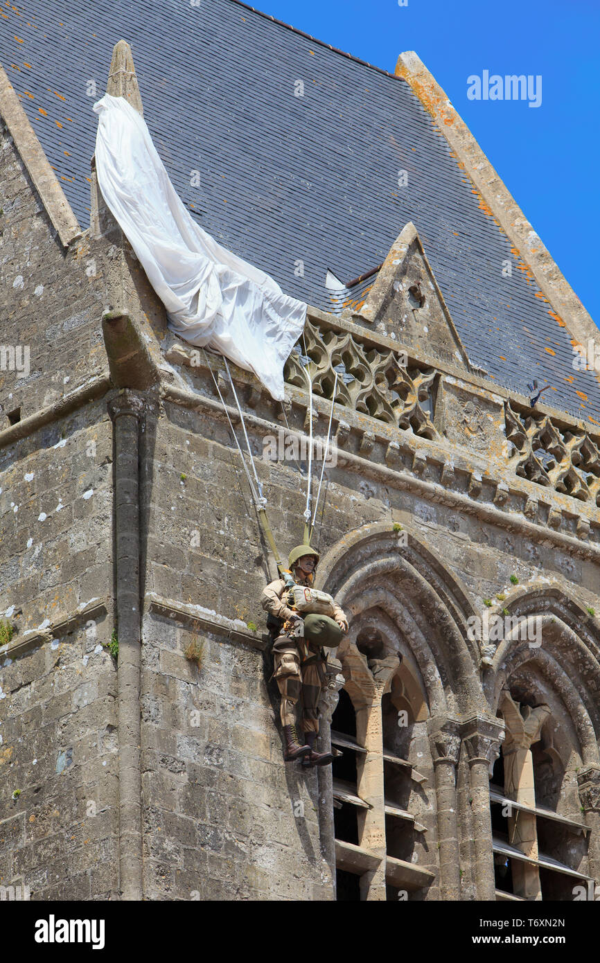 Church with Parachute Memorial at Sainte-Mere-Eglise where John Steele of  the 505th Parachute Infantry Regiment got stuck on D-Day in Normandy,  France Stock Photo - Alamy