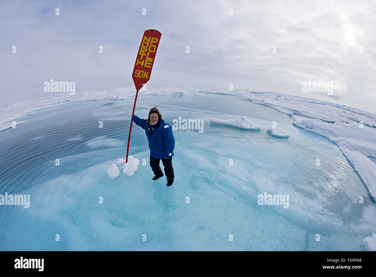 Photographer Sue Flood standing at North Pole sign. Russia Arctic, trip to North  Pole on board Russian nuclear icebreaker Yamal Stock Photo - Alamy