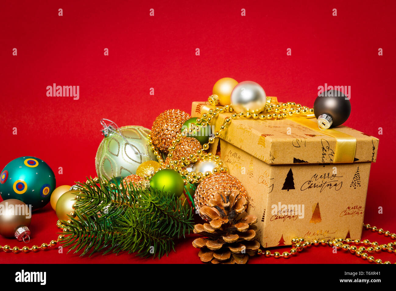 Christmas decoration gift box with red background Stock Photo