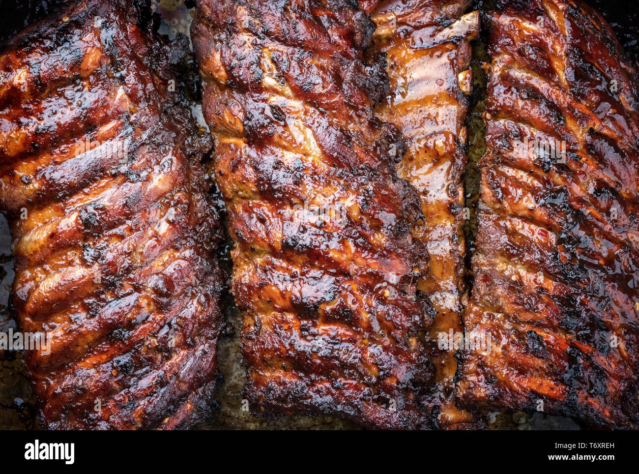 Barbecue spare ribs St Louis cut with hot honey chili marinade as top ... Barbecue spare ribs St Louis cut with hot honey chili marinade as top ...