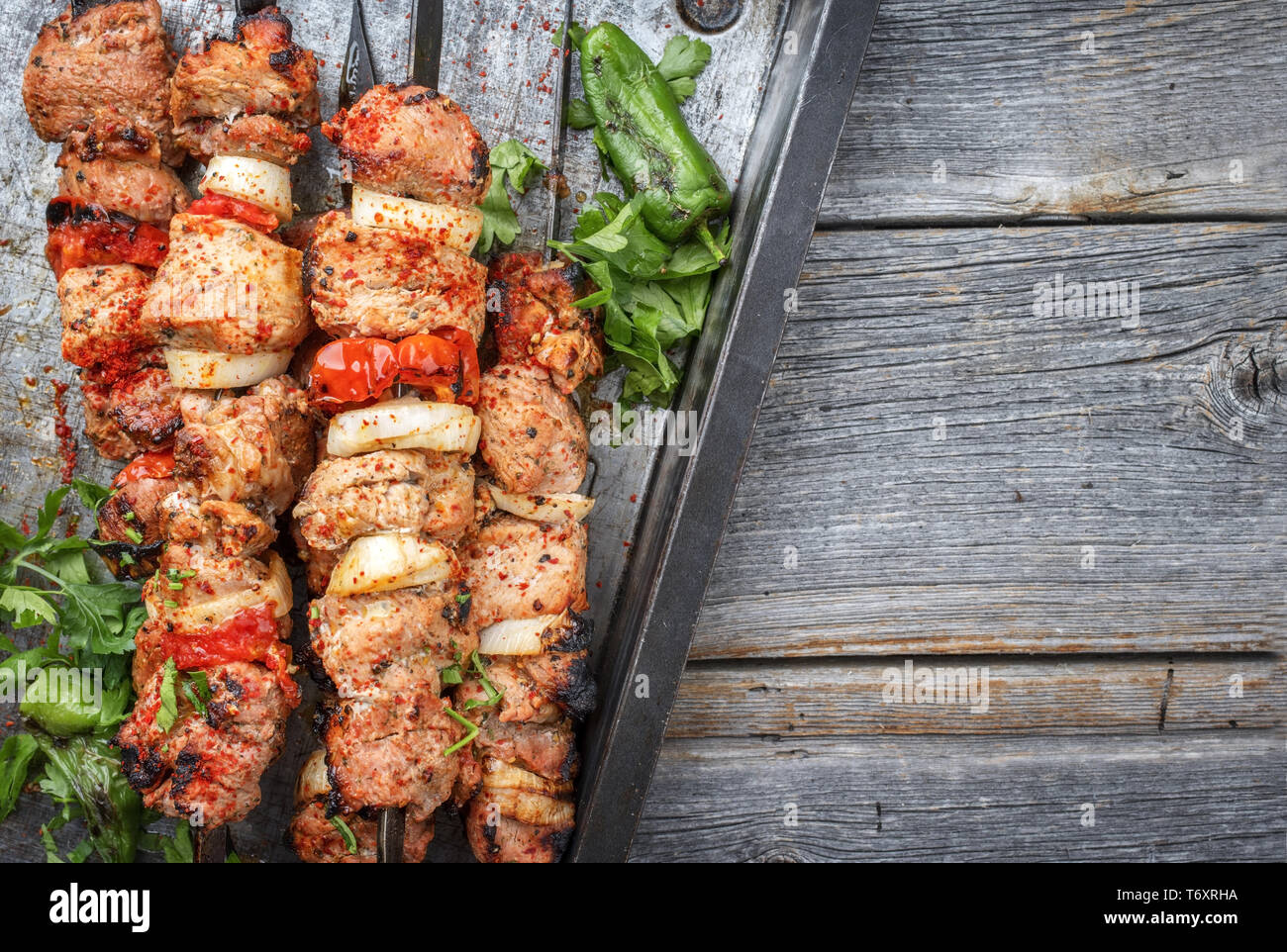 Traditional Greek souvlaki barbecue skewer with tomato Stock Photo Alamy