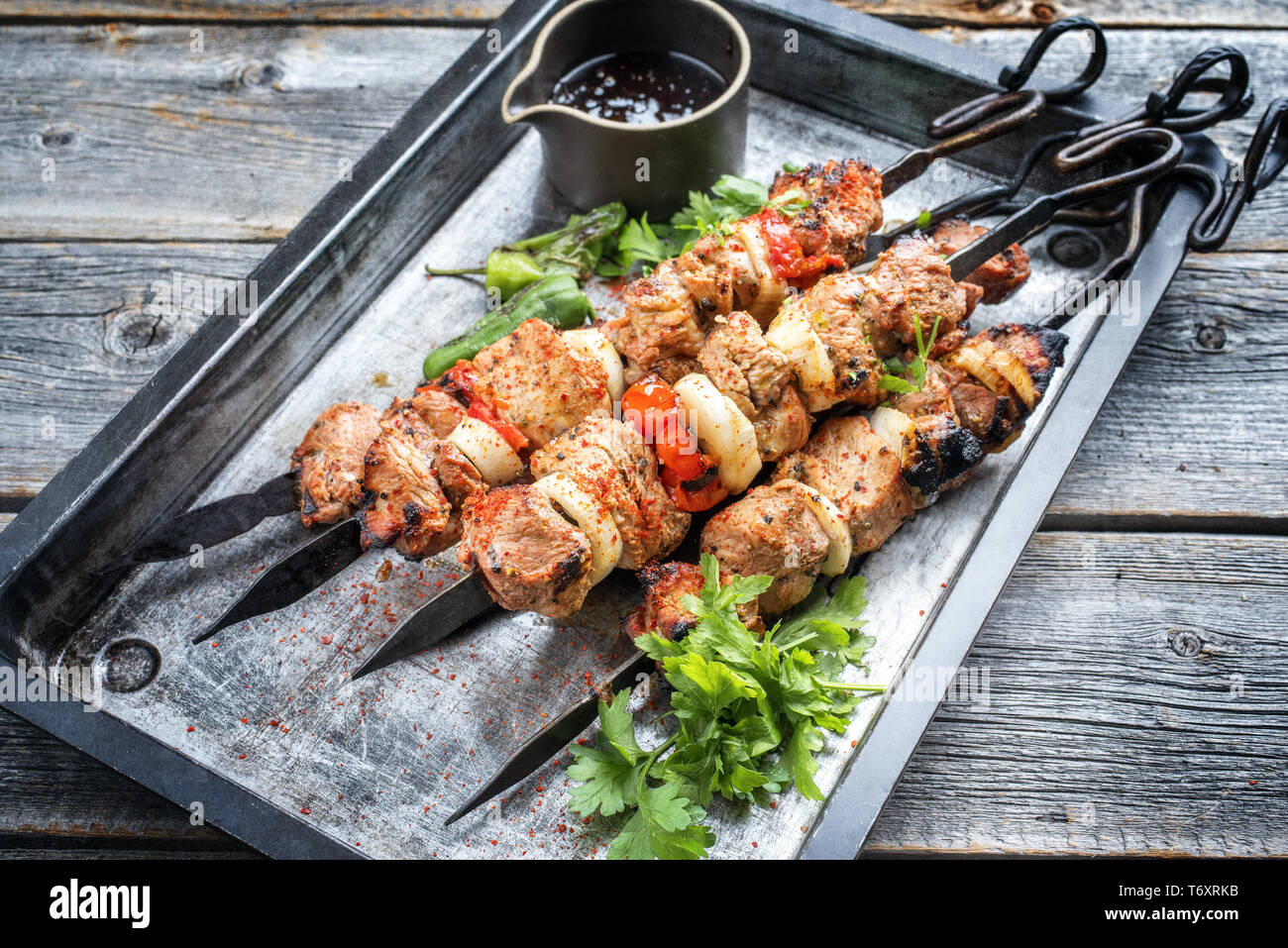 Traditional Greek souvlaki barbecue skewer with tomato Stock Photo Alamy