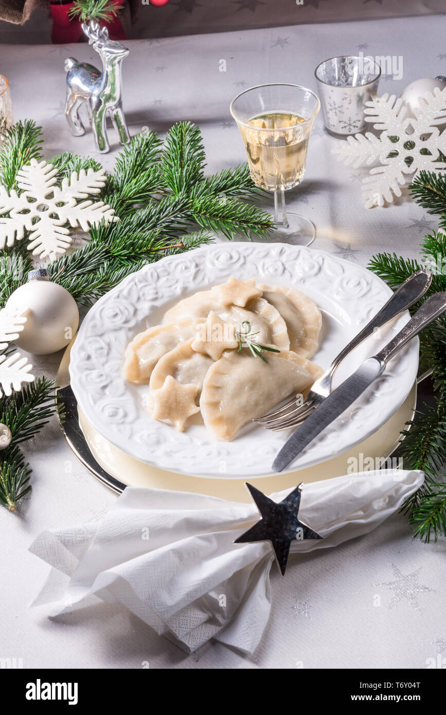 Polish style dumplings filled with sauerkraut and mushrooms Stock Photo