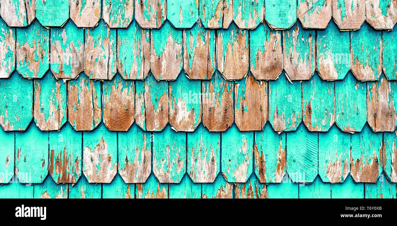 Vintage architecture detail with turquoise wood paneling, a traditional surface covering walls in the Lake District in and around Puerto Varas, Chile. Stock Photo