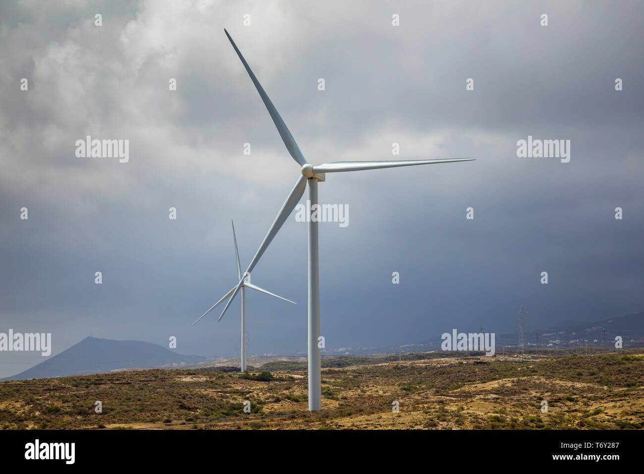 Wind turbines on the island as an ecological source of cheap energy. Tenerife, Canary Islands, Spain Stock Photo