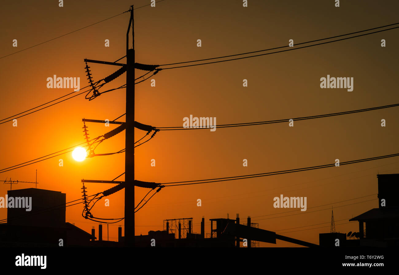 High voltage electric pole and transmission lines in the city ...