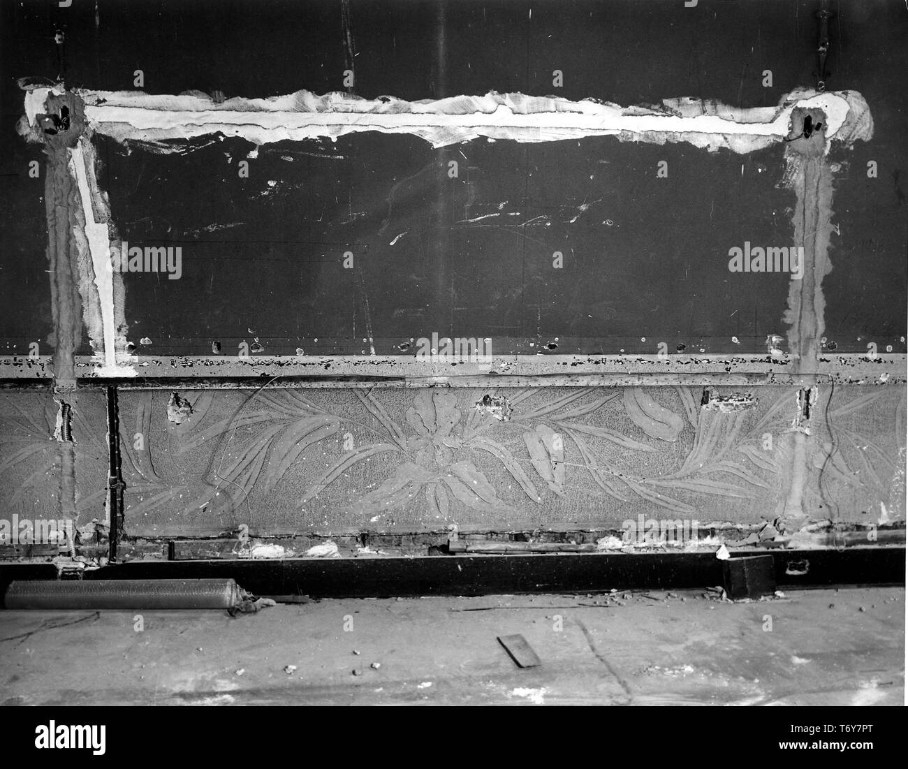 An Art Nouveau floral motif, on a stone dado spanning the west wall of the Red Room, photographed during President Truman's White House Reconstruction, Washington, District of Columbia, February 23, 1950. Image courtesy National Archives. () Stock Photo