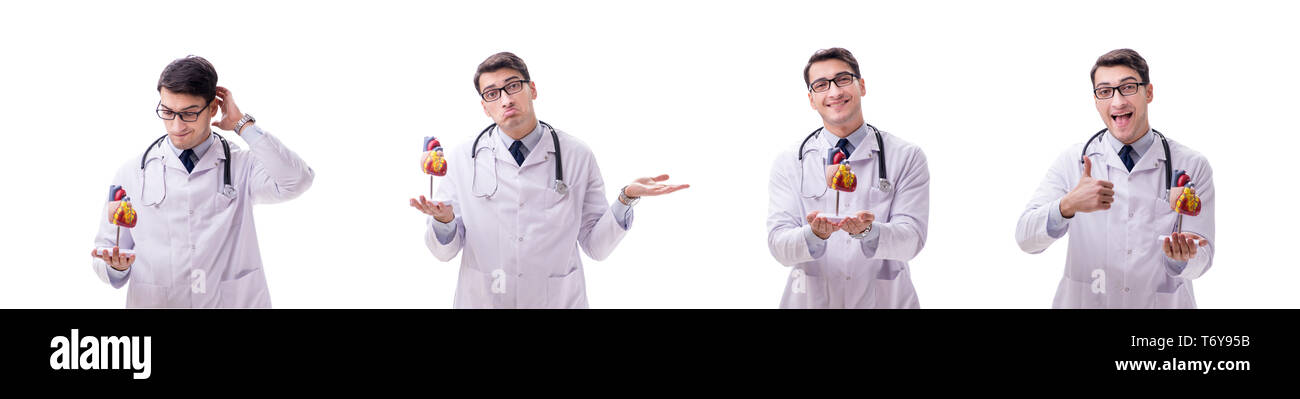 Young doctor with heart shape isolated on white Stock Photo - Alamy