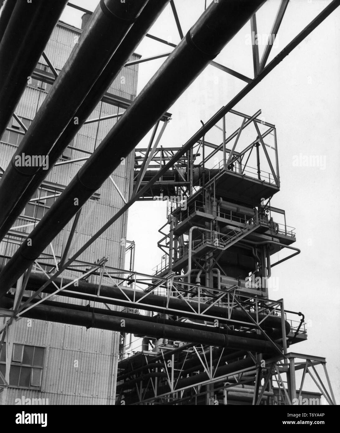 Low-angle view of reactor number 1's heat exchange pipework, which carries steam to the turbine, Calder Hall nuclear power plant, Sellafield, United Kingdom, 1956. Image courtesy US Department of Energy. () Stock Photo