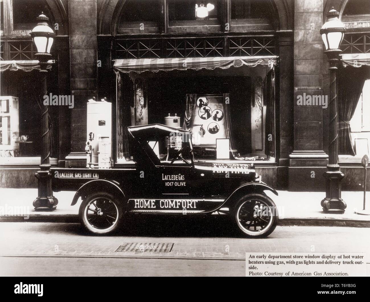 The Laclede Gas Light Company's Ford Model T delivery truck, with a gas water heater loaded in the bed, parked in front of the Laclede Gas building, St Louis, Missouri, 1925. Image courtesy American Gas Association/US Department of Energy. () Stock Photo