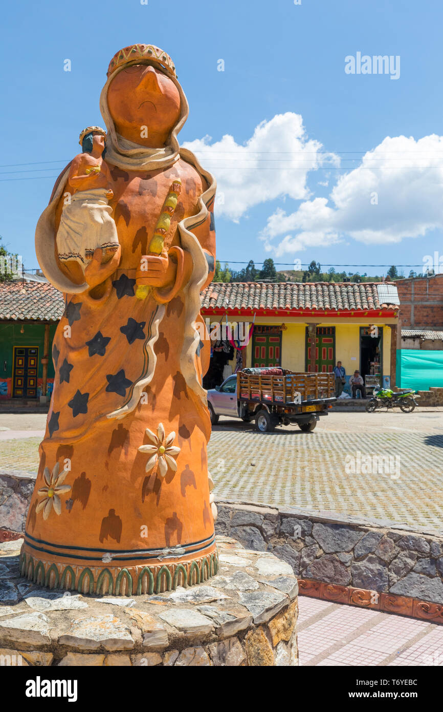 statue of woman in clay main square Raquira Colombia Stock Photo
